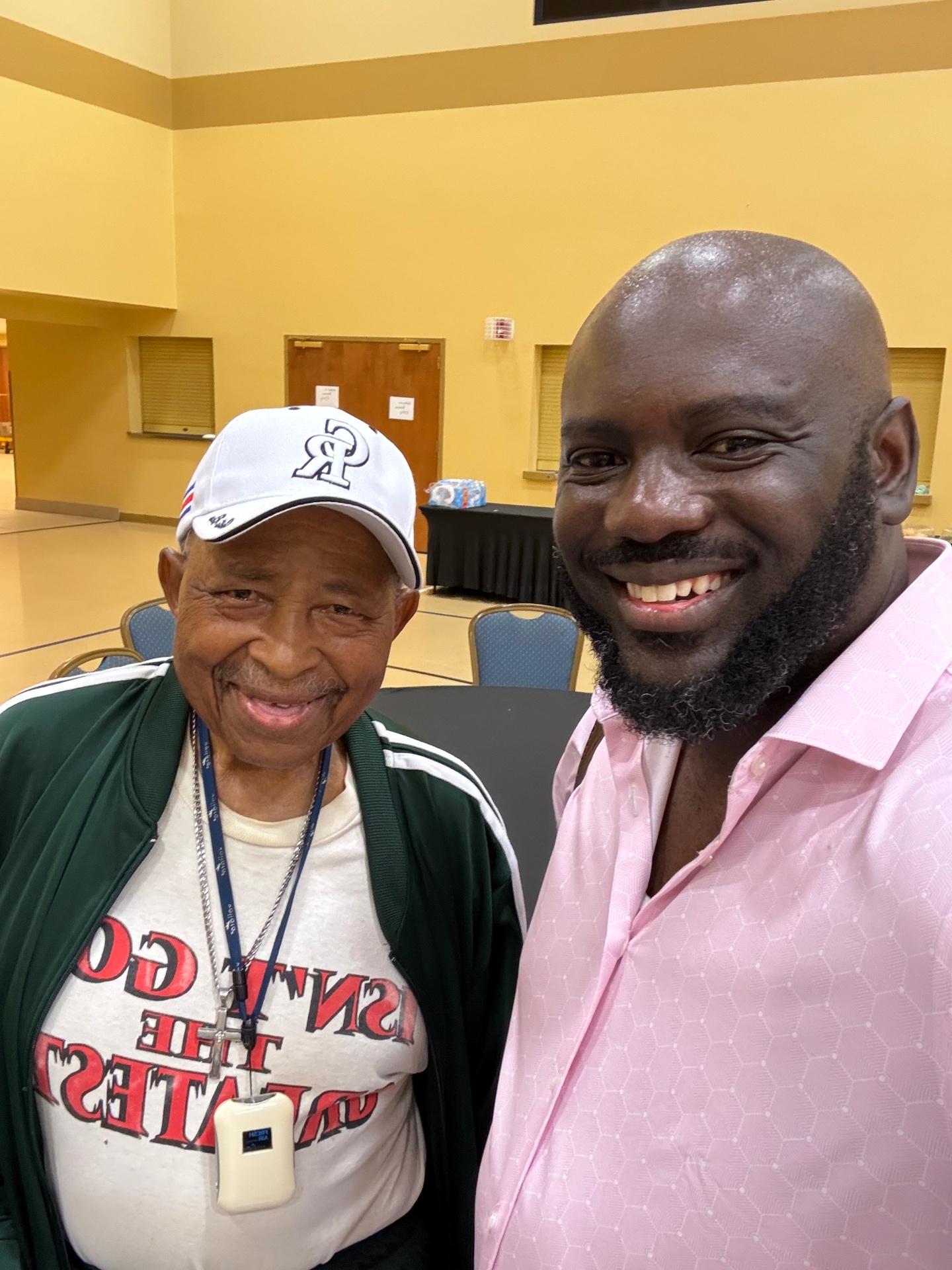 Brown with a longtime mentor post-event